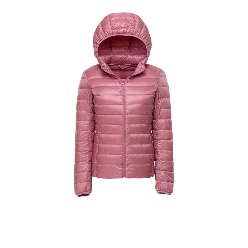 Doudoune de randonnée à capuche pour femme, coloris rose poudré, vue de face
