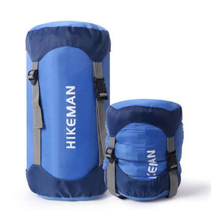 Sac de compression bleu, grande taille et petite taille côte à côte