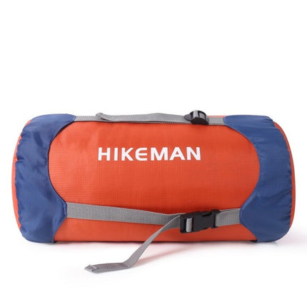 Sac de compression pour sac de couchage, bleu et orange, avec ses sangles